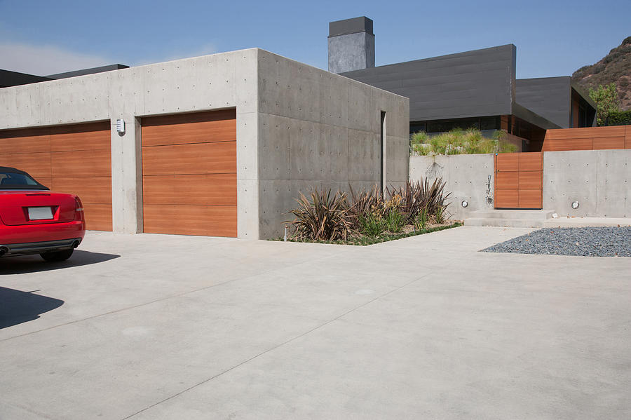 Exterior of modern two-car garage Photograph by Tom Merton
