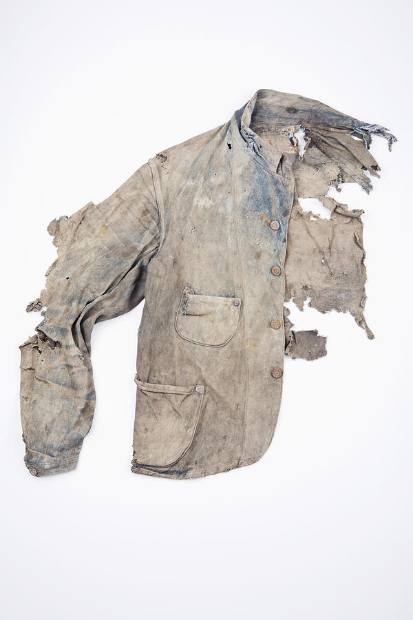 Extremely damaged denim jacket Photograph by Michael Wells