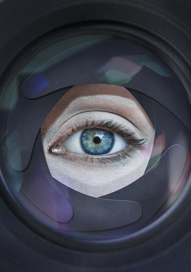 Eye looking through aperture ring of camera Photograph by Dimitri Otis