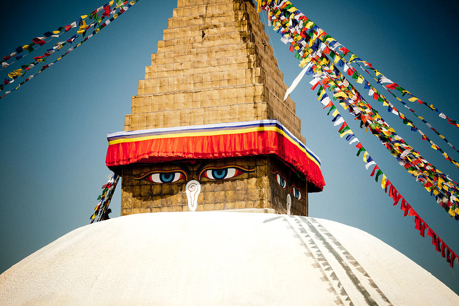 Eye of Tibetan stupa Boudnath and Buddhist Prayer Flags  Photograph by Raimond Klavins