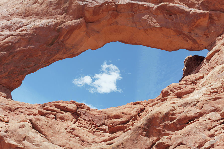 Eye Shaped Arch With One White Cloud Photograph by Arturbo
