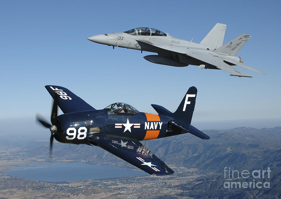 Transportation Photograph - Fa-18 Hornet And F8f Bearcat Flying by Phil Wallick