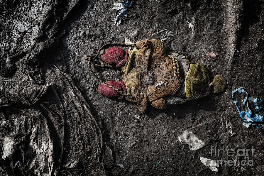 Discarded Photograph - Face doon in the dirt by John Farnan