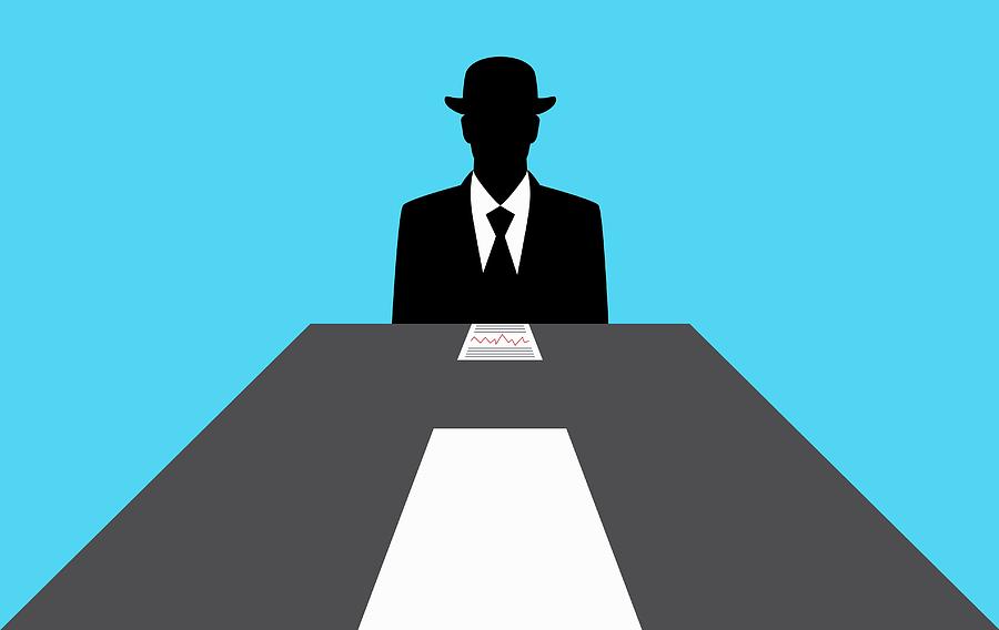 Faceless Businessman Sitting Photograph by Ikon Images