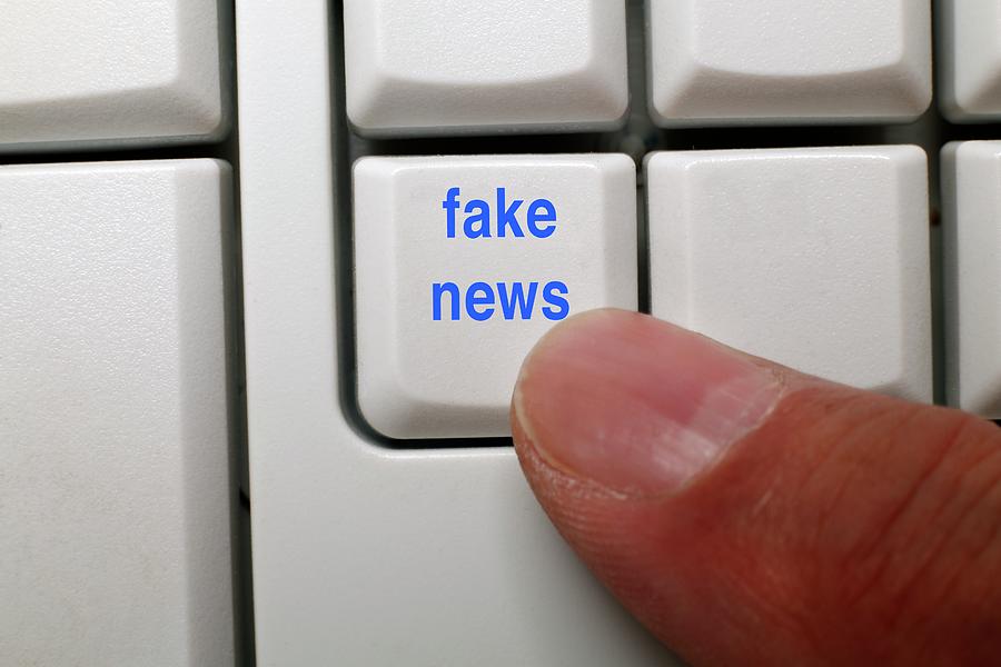 Fake News Key On A Computer Keyboard Photograph by Victor De Schwanberg/science Photo Library