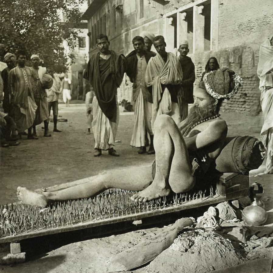 Fakir On His Bed Of Spikes Photograph by Library Of Congress