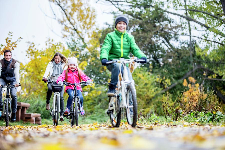 Family Cycling Together Photograph by Science Photo Library