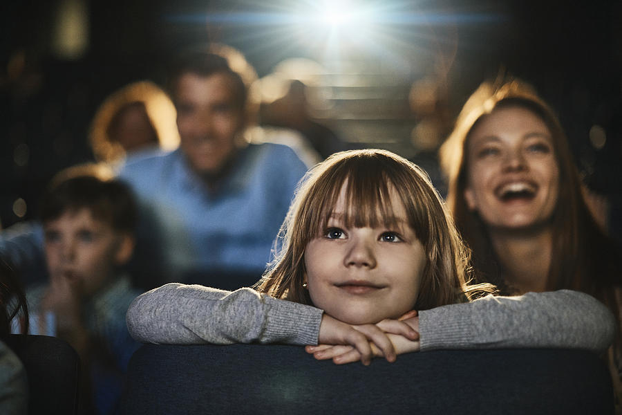Family in the cinema Photograph by Geber86