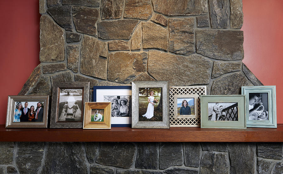 Family Photos on Mantle Large Group Photograph by Jeffrey Coolidge