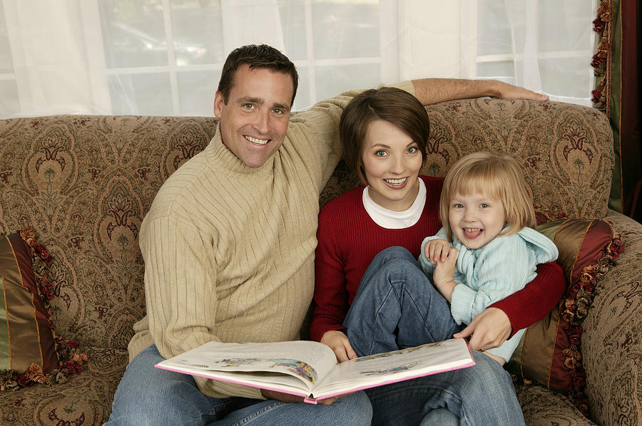 Family reading Photograph by Comstock Images