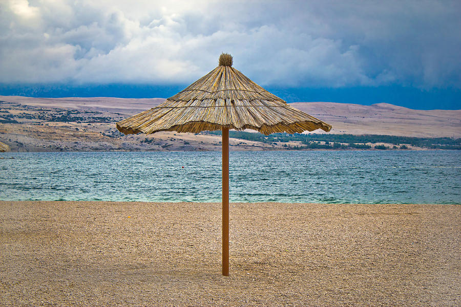 Famous Zrce beach umbrella out of season Photograph by Brch Photography