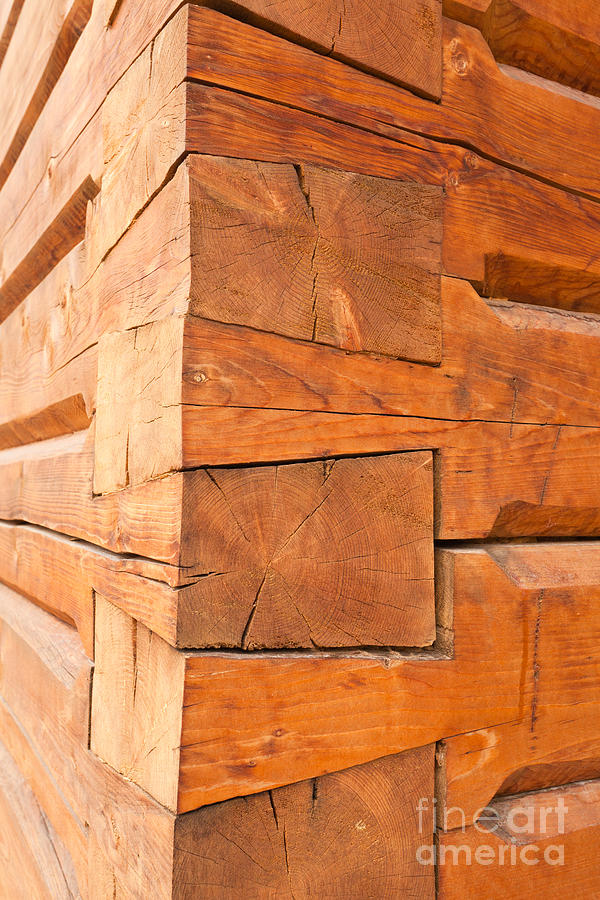 Fancy timber joints on the corner of log cabin Photograph by Stephan