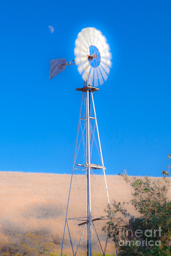 Farm Windmill And The Moon Blue Sky Fine Art Photography Print Photograph by Jerry Cowart