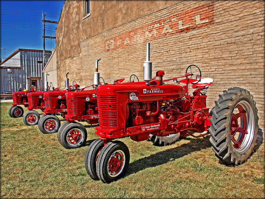 Farmall tractors Photograph by John Anderson