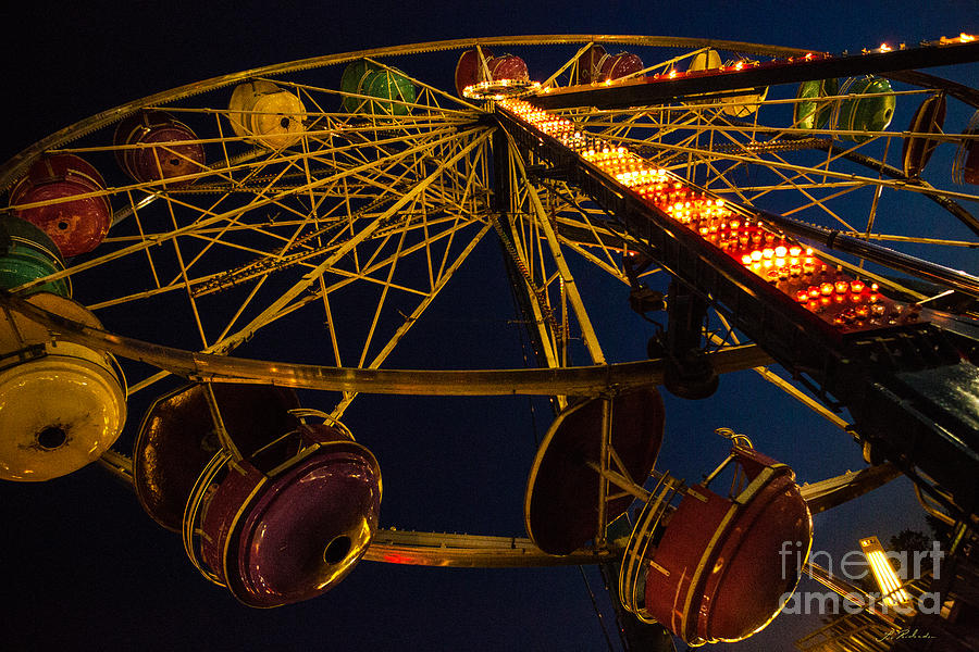 Copyright Owner Photograph - Farris wheel at night by Iris Richardson