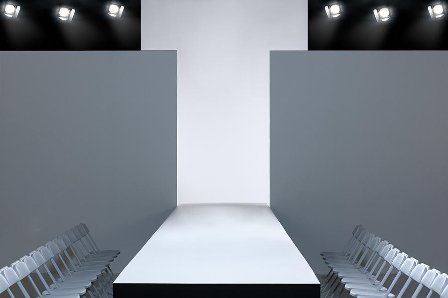 Fashion show and empty catwalk Photograph by Image Source
