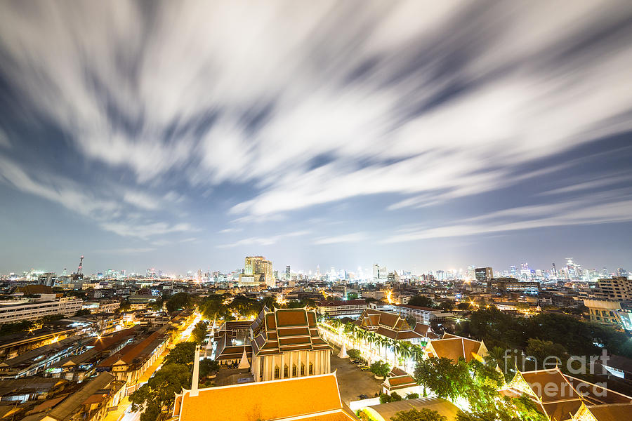 Fast clouds above Bangkok Photograph by Didier Marti