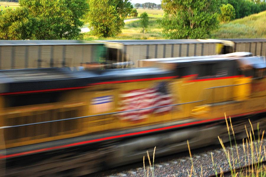 Fast Train Photograph by Bill Kesler