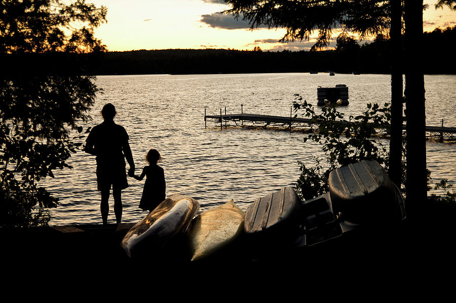 Father And Daughter Watch A Sunset On Photograph by Brian Guzzetti / Design Pics Father And Daughter Watch A Sunset On Photograph by Brian Guzzetti / Design Pics