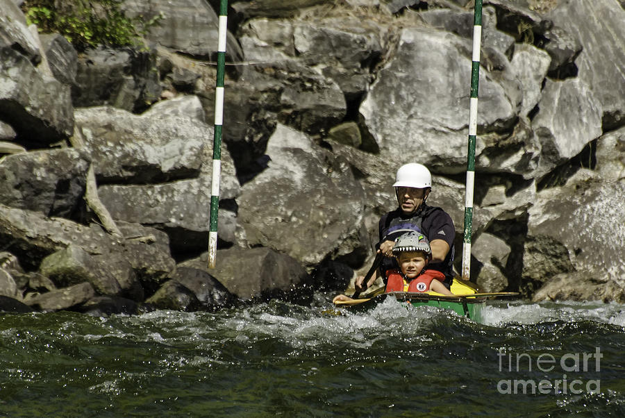Father and son in a whitewater canoe Photograph by Les Palenik