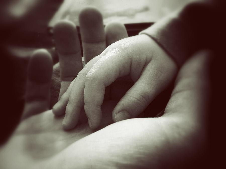 Nail Photograph - Father and Son by Marco Oliveira