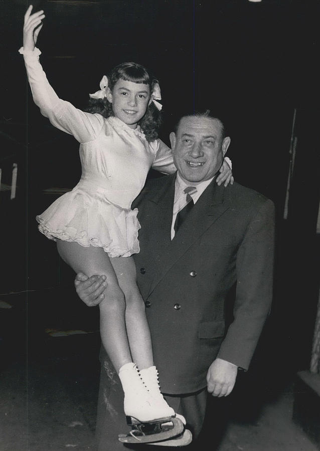 Father Strong Man; Daughter Champion Skater Photograph by Retro Images Archive