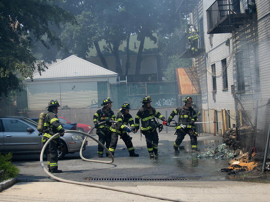 Fearless Fireman Photograph by Laura Corebello | Fine Art America