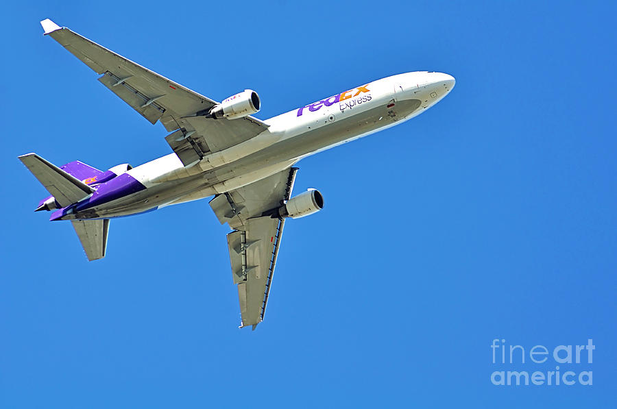 Airplane Photograph - FedEx at work by Kaye Menner