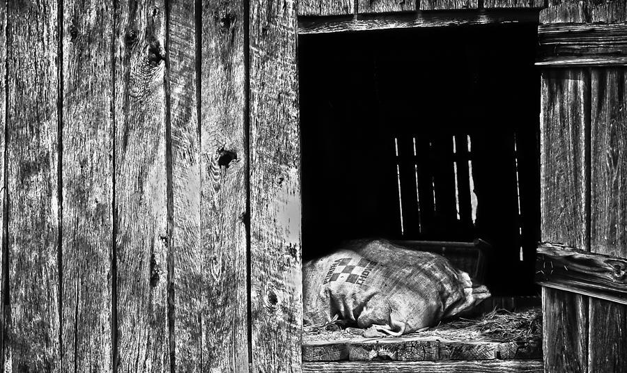 Feed Sack in Loft  BW Photograph by Greg Jackson