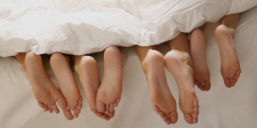 Bed Photograph - Feet In Bed by Leah Hammond