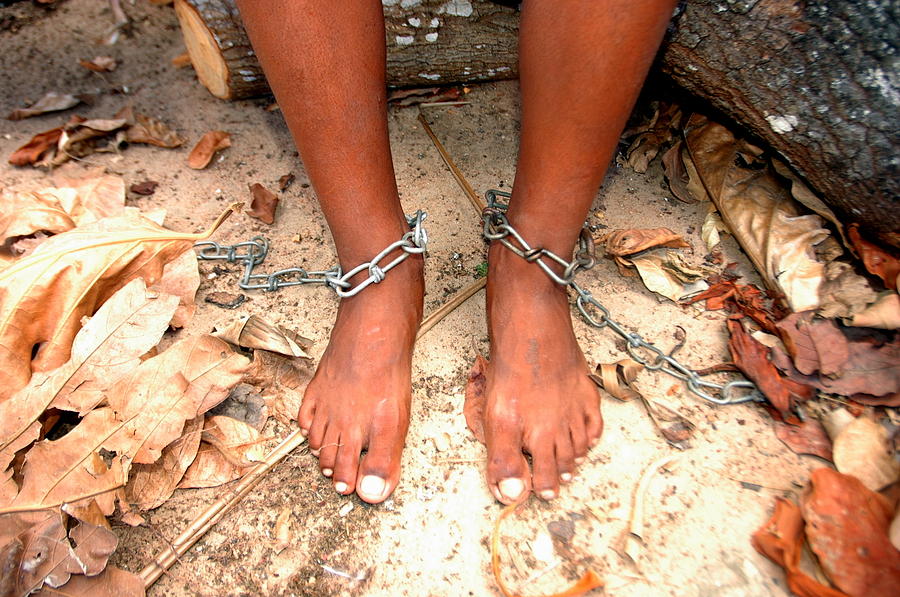 Feet in Chains Photograph by Wallace Moura