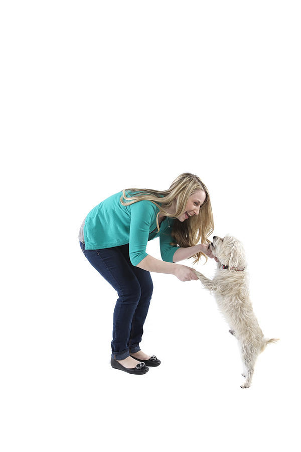 Female and her dog photographed in the studio. Photograph by Jared McMillen