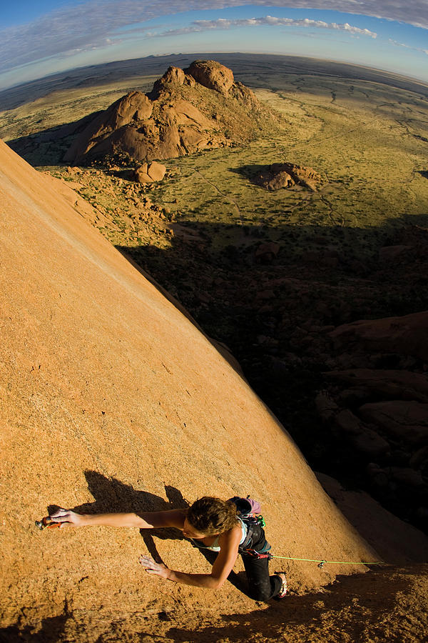 Desert Photograph - Female Athlete Climbing A 5.12b Route by Gabe Rogel
