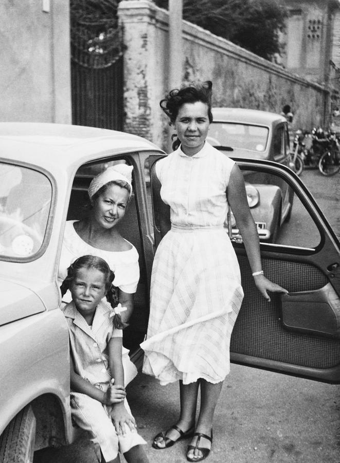 Female Child with Family inside Car,1951. Black And White Photograph by Lisa-Blue