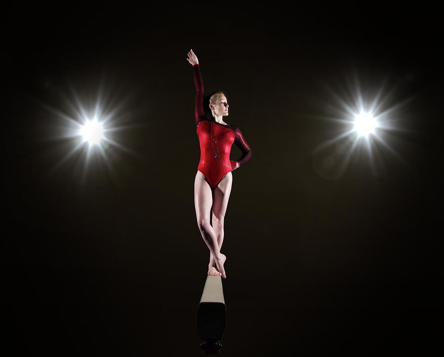 Female Gymnast On Balancing Beam Photograph by Mike Harrington