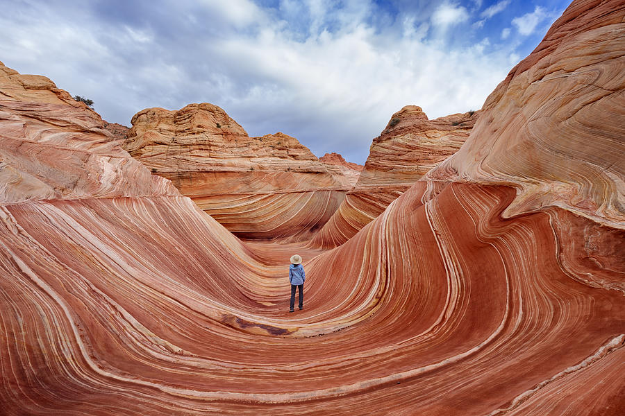 Female hiker in Coyote Buttes North, Vermilion Cliffs National Monument, Arizona Photograph by Sumiko Scott