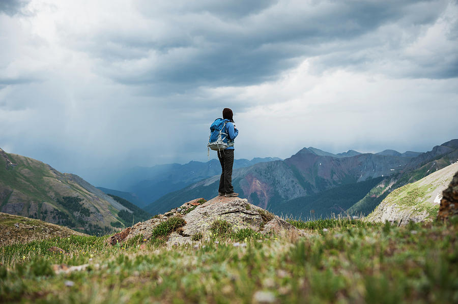 Female Hiker Watches Approaching Photograph by Cody Duncan Female Hiker Watches Approaching Photograph by Cody Duncan