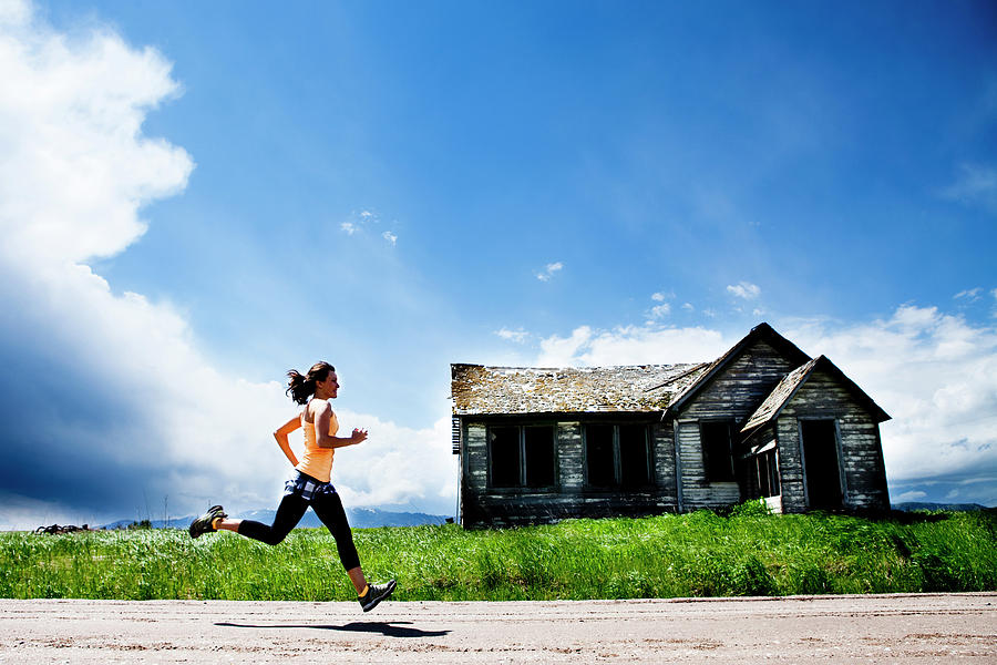 Female Jogging In The Country Photograph By Jordan Siemens Fine Art