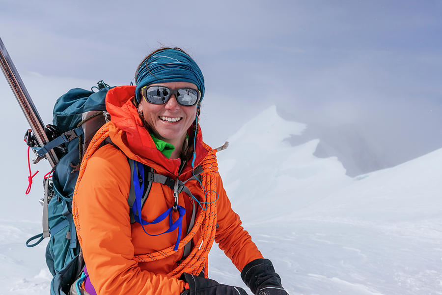 Female Mountaineer Smiling At Camera Photograph by Andrew Peacock ...