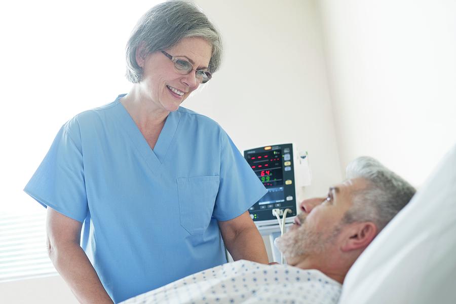 Female Nurse And Male Patient Photograph by Science Photo Library - Pixels