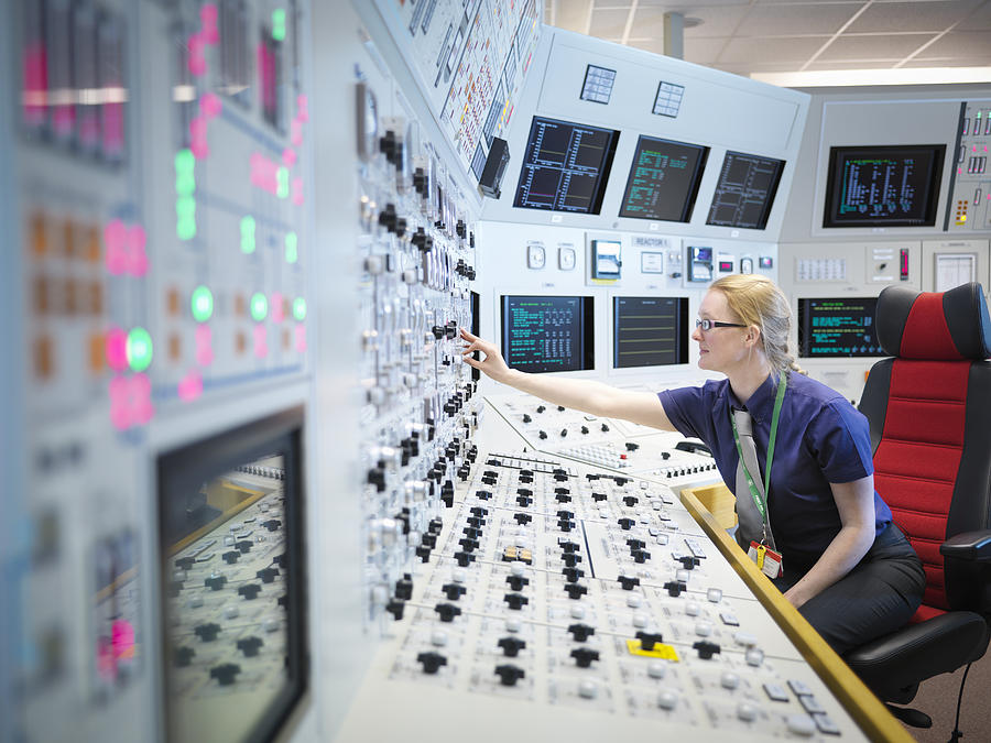 Female operator in nuclear power station control room simulator Photograph by Monty Rakusen