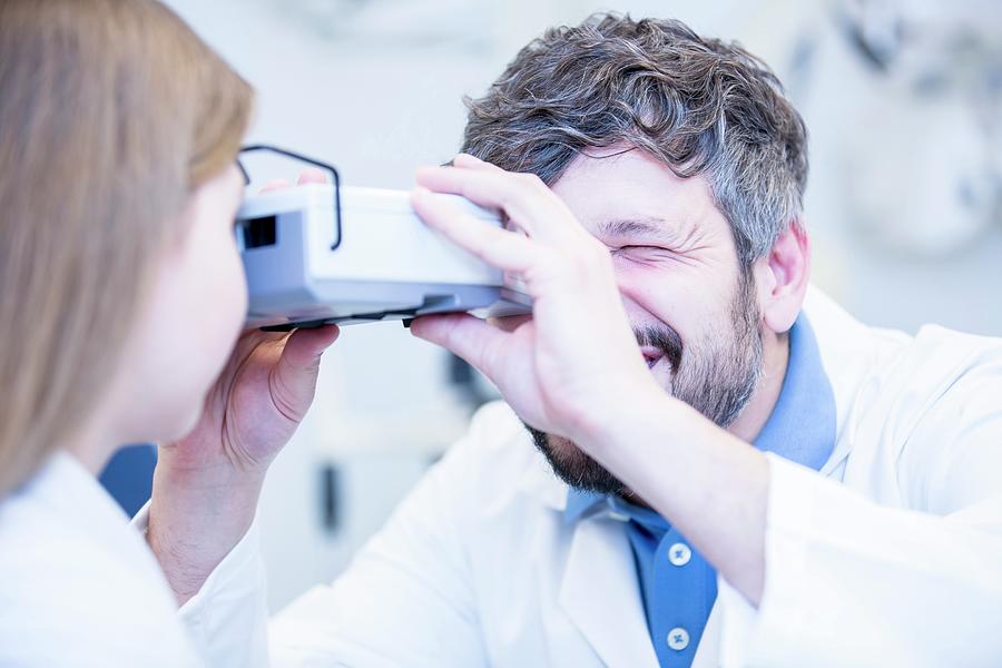 Female Patient Having Eye Examination Photograph by Science Photo Library