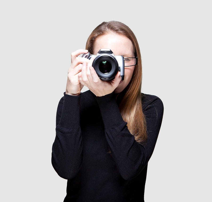 Female Photographer takes photo Photograph by James Whitaker
