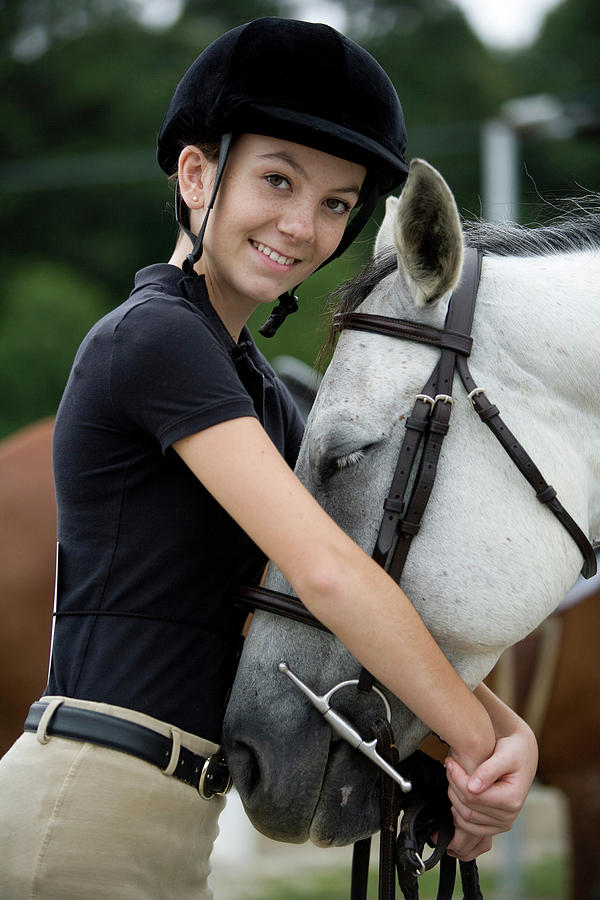 Atlanta Photograph - Female Rider Hugs Her White Horse by Chris Ross