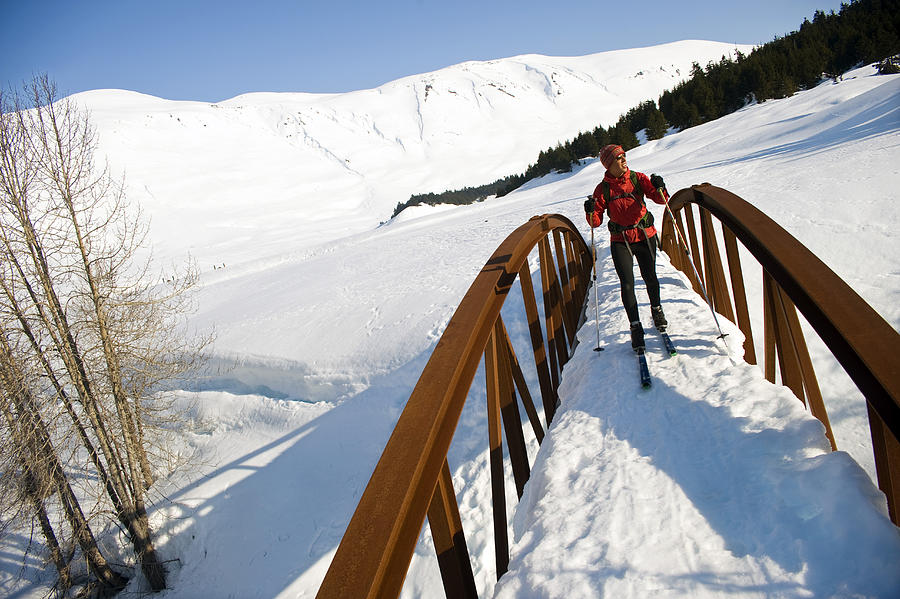 Bridge Photograph - Female Skier Tours The Center Ridge by Matt Hage