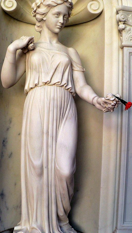 Female Statue With Red Flower Photograph by Jeff Lowe