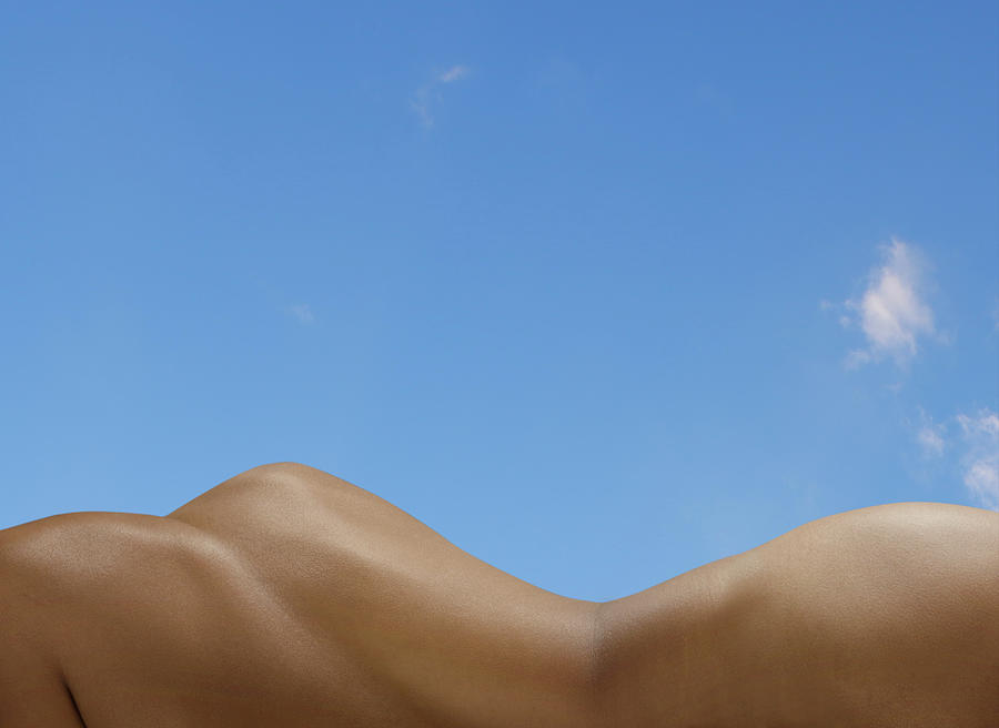 Females Body, Blue Sky In The Background Photograph by Jonathan Knowles