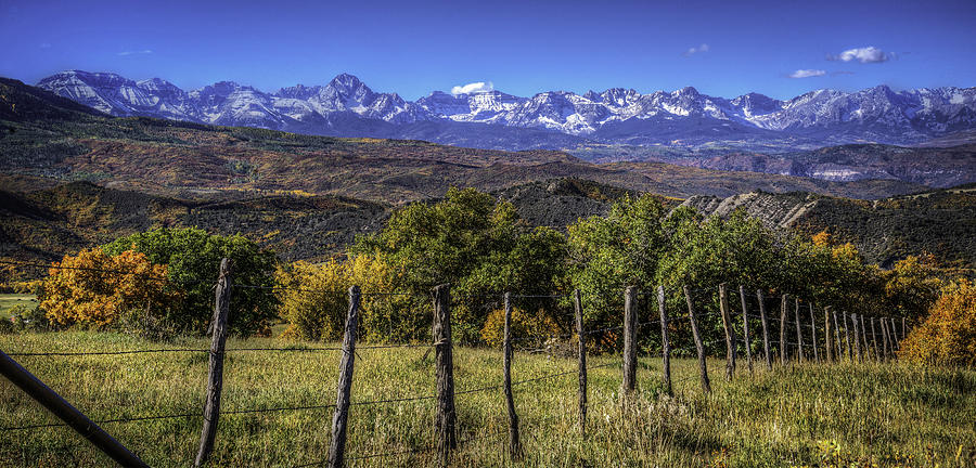 Fence Line and Mountains Photograph by David Waldrop