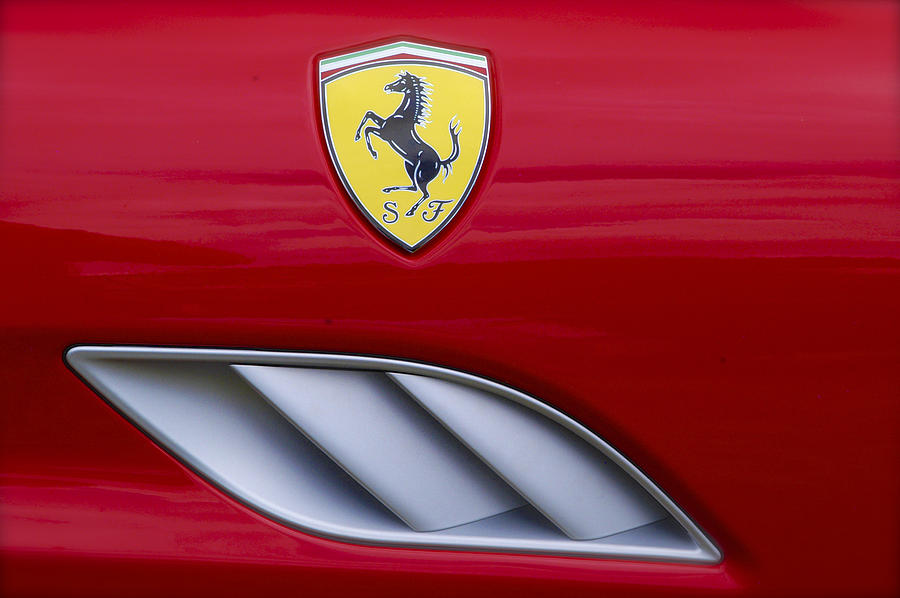 Ferrari Badge and Bodywork Grille Detail Photograph by John Colley