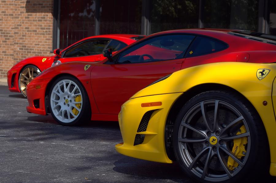 Ferrari Line Up Photograph by Tim McCullough